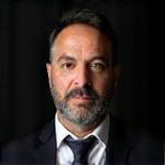 Retrato profesional de Andrés Giraldo, especialista en post-producción de audio